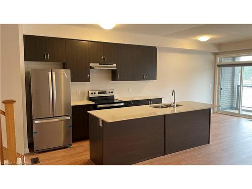 610-585 Colborne Street E, Brantford, ON - Indoor Photo Showing Kitchen With Stainless Steel Kitchen With Double Sink