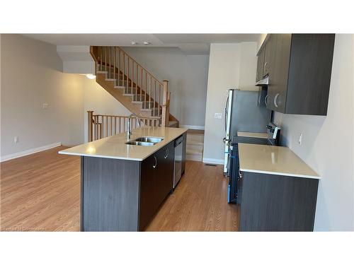 610-585 Colborne Street E, Brantford, ON - Indoor Photo Showing Kitchen With Double Sink