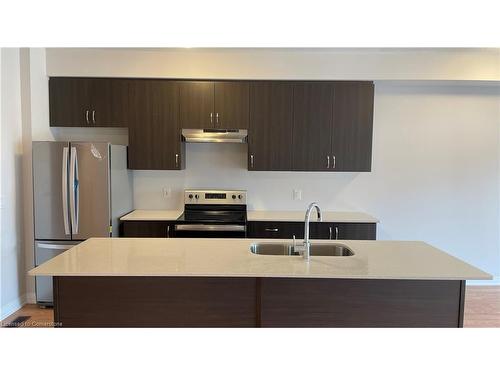 610-585 Colborne Street E, Brantford, ON - Indoor Photo Showing Kitchen With Stainless Steel Kitchen With Double Sink With Upgraded Kitchen