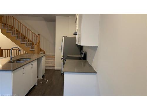 712-585 Colborne Street E, Brantford, ON - Indoor Photo Showing Kitchen With Double Sink