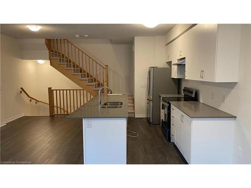 712-585 Colborne Street E, Brantford, ON - Indoor Photo Showing Kitchen With Double Sink