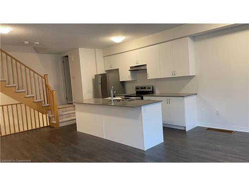 712-585 Colborne Street E, Brantford, ON - Indoor Photo Showing Kitchen With Double Sink