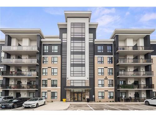 203-650 Sauve Street, Milton, ON - Outdoor With Balcony With Facade