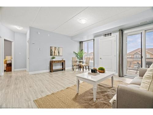 203-650 Sauve Street, Milton, ON - Indoor Photo Showing Living Room