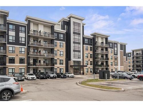 203-650 Sauve Street, Milton, ON - Outdoor With Balcony With Facade