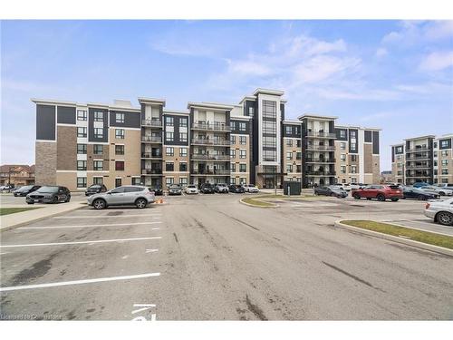 203-650 Sauve Street, Milton, ON - Outdoor With Balcony With Facade