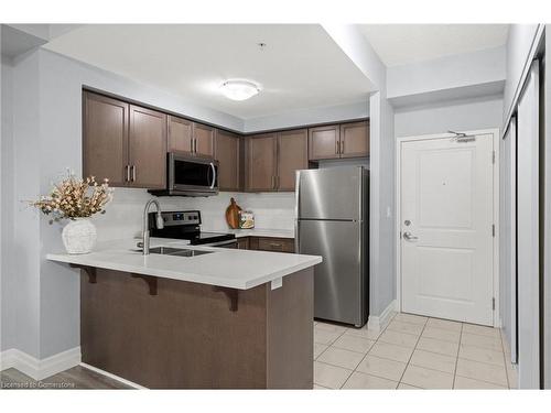 203-650 Sauve Street, Milton, ON - Indoor Photo Showing Kitchen With Stainless Steel Kitchen