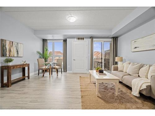 203-650 Sauve Street, Milton, ON - Indoor Photo Showing Living Room