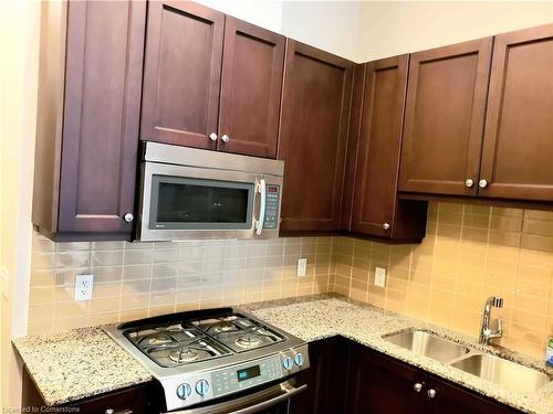 102-11 Bronte Road, Oakville, ON - Indoor Photo Showing Kitchen With Double Sink