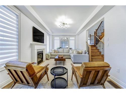 189 Granite Ridge Trail, Waterdown, ON - Indoor Photo Showing Living Room With Fireplace