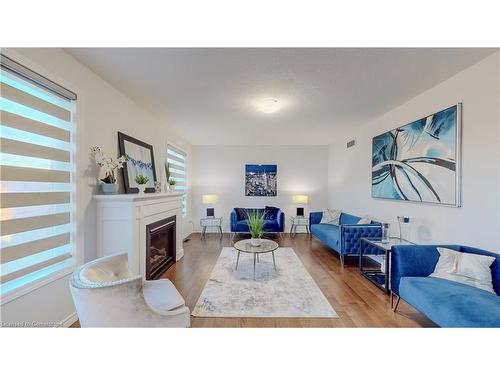 39 Hollingshead Road Road, Ingersoll, ON - Indoor Photo Showing Living Room With Fireplace