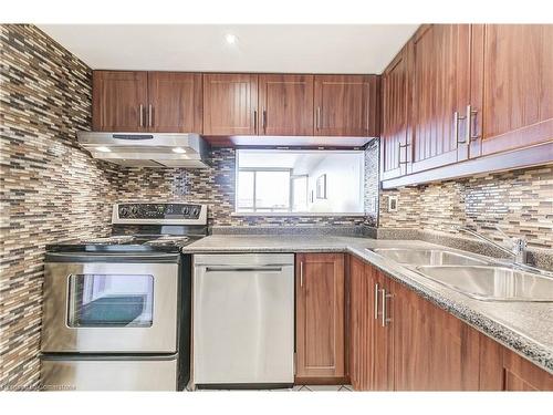 1203-75 King Street E, Mississauga, ON - Indoor Photo Showing Kitchen With Double Sink