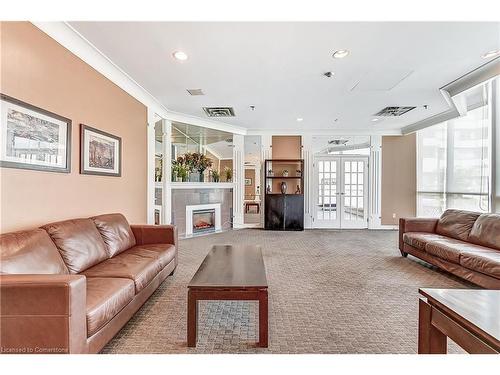 1203-75 King Street E, Mississauga, ON - Indoor Photo Showing Living Room With Fireplace