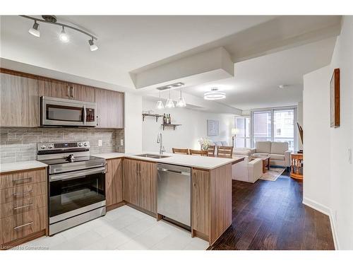 407-4080 Living Arts Drive, Mississauga, ON - Indoor Photo Showing Kitchen With Double Sink With Upgraded Kitchen