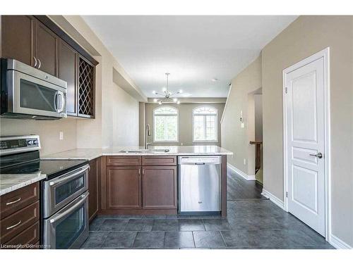 79-541 Winston Road, Grimsby, ON - Indoor Photo Showing Kitchen With Stainless Steel Kitchen