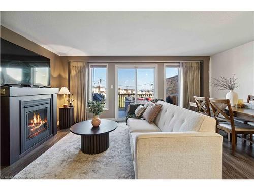 27 Red Clover Crescent, Kitchener, ON - Indoor Photo Showing Living Room With Fireplace