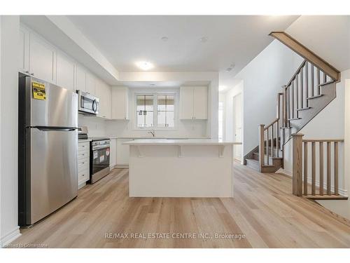 75-1317 Leriche Way, Milton, ON - Indoor Photo Showing Kitchen With Stainless Steel Kitchen With Upgraded Kitchen