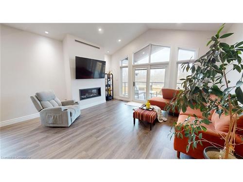 19 Winchester Crescent, Listowel, ON - Indoor Photo Showing Living Room With Fireplace