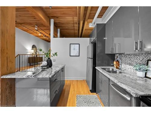 113-993 Queen Street W, Toronto, ON - Indoor Photo Showing Kitchen With Double Sink