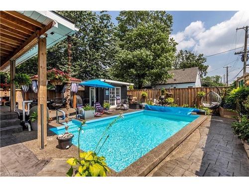 252 Walter Avenue N, Hamilton, ON - Outdoor With In Ground Pool With Backyard