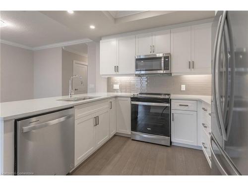 910-460 Callaway Road, London, ON - Indoor Photo Showing Kitchen With Upgraded Kitchen