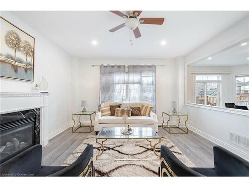 8 Decorso Drive, Peel, ON - Indoor Photo Showing Living Room With Fireplace