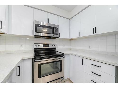 304-4879 Kimbermount Avenue, Mississauga, ON - Indoor Photo Showing Kitchen