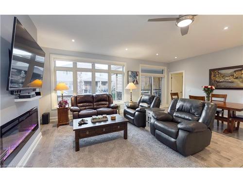 18-9245 Shoveller Avenue, Niagara Falls, ON - Indoor Photo Showing Living Room With Fireplace