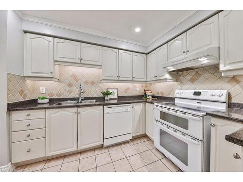 35-3050 Orleans Road, Mississauga, ON - Indoor Photo Showing Kitchen With Double Sink