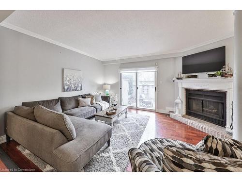 35-3050 Orleans Road, Mississauga, ON - Indoor Photo Showing Living Room With Fireplace