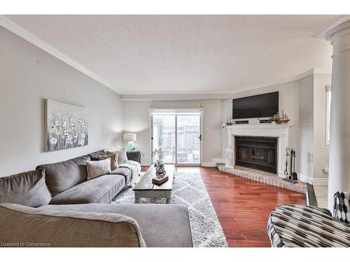 35-3050 Orleans Road, Mississauga, ON - Indoor Photo Showing Living Room With Fireplace