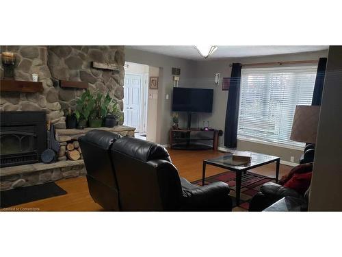 1413 Stoney Creek Road, Caledonia, ON - Indoor Photo Showing Living Room With Fireplace