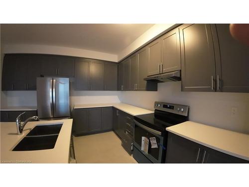 889 Knights Lane, Woodstock, ON - Indoor Photo Showing Kitchen With Double Sink