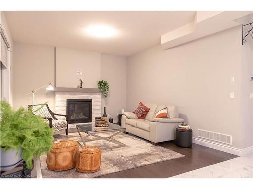 64 Burton Street, Innerkip, ON - Indoor Photo Showing Living Room With Fireplace