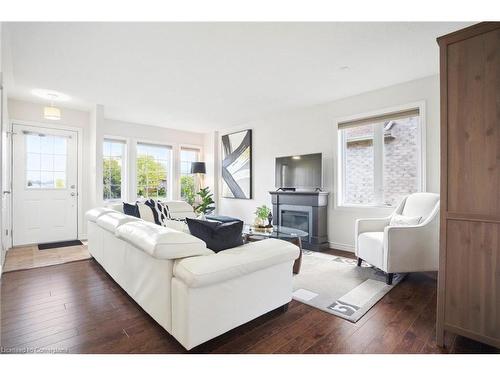 24 Pollard Street, Norwich, ON - Indoor Photo Showing Living Room With Fireplace