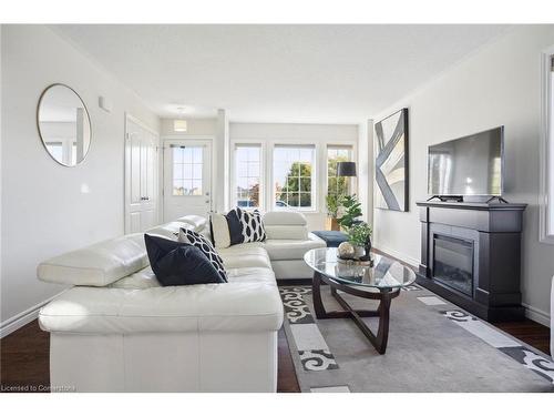 24 Pollard Street, Norwich, ON - Indoor Photo Showing Living Room With Fireplace