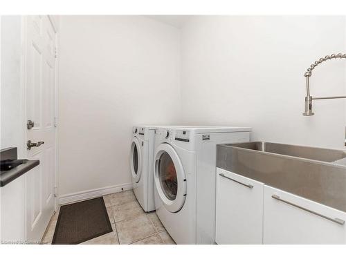 7-310 Southbrook Drive, Binbrook, ON - Indoor Photo Showing Laundry Room