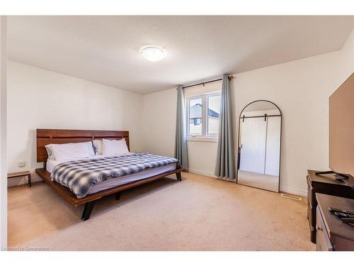 7-310 Southbrook Drive, Binbrook, ON - Indoor Photo Showing Bedroom