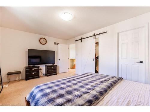 7-310 Southbrook Drive, Binbrook, ON - Indoor Photo Showing Bedroom