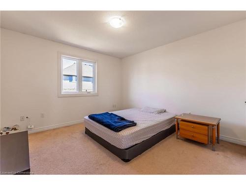 7-310 Southbrook Drive, Binbrook, ON - Indoor Photo Showing Bedroom