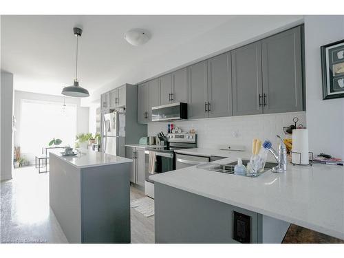 5-314 Equestrian Way, Cambridge, ON - Indoor Photo Showing Kitchen With Stainless Steel Kitchen With Upgraded Kitchen