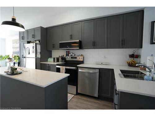 5-314 Equestrian Way, Cambridge, ON - Indoor Photo Showing Kitchen With Stainless Steel Kitchen With Upgraded Kitchen