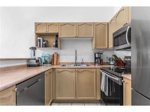 409-4005 Kilmer Drive, Burlington, ON - Indoor Photo Showing Kitchen With Double Sink