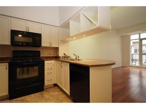 320-330 Princess Royal Drive, Mississauga, ON - Indoor Photo Showing Kitchen With Double Sink