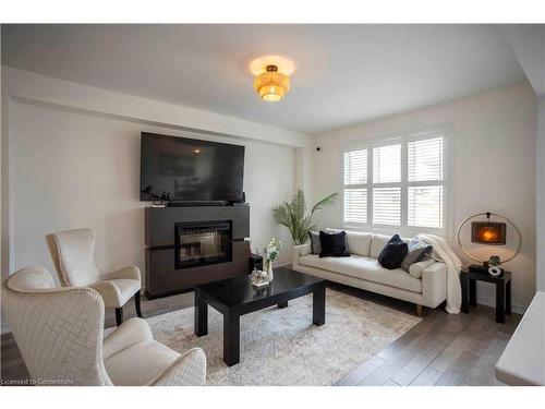 103 Kay Crescent, Fergus, ON - Indoor Photo Showing Living Room With Fireplace