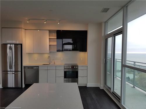 2503-33 Shore Breeze Drive, Toronto, ON - Indoor Photo Showing Kitchen