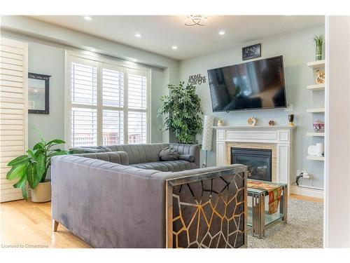 584 Pinery Trail, Waterloo, ON - Indoor Photo Showing Living Room With Fireplace