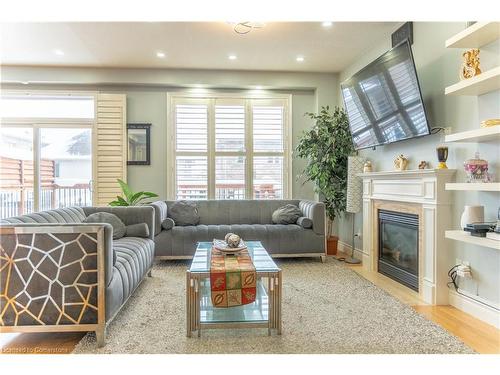 584 Pinery Trail, Waterloo, ON - Indoor Photo Showing Living Room With Fireplace