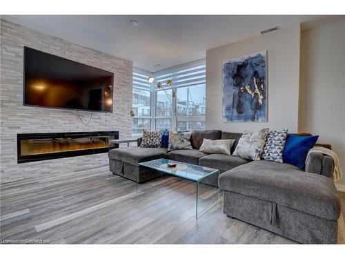 10-233 Broward Way, Innisfil, ON - Indoor Photo Showing Living Room With Fireplace