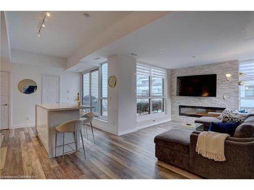 10-233 Broward Way, Innisfil, ON - Indoor Photo Showing Living Room With Fireplace